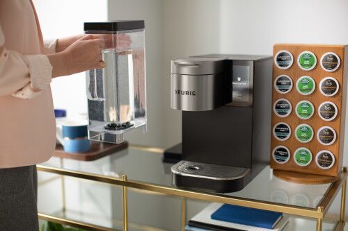 filling water reservoir of commercial keurig coffee brewer