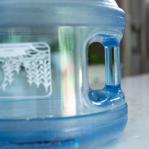 Distillata artesian spring water 3-gallon bottle with a built in handle