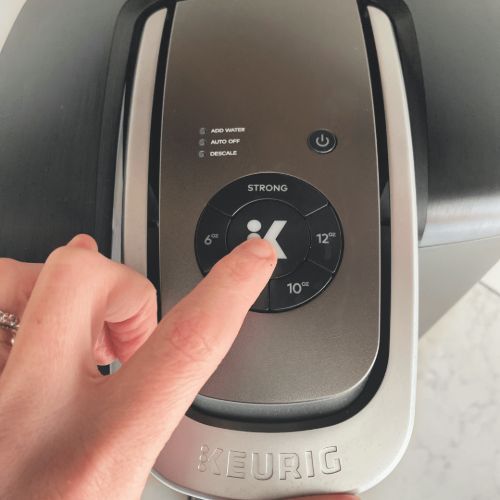 adjusting the settings on a keurig coffee maker