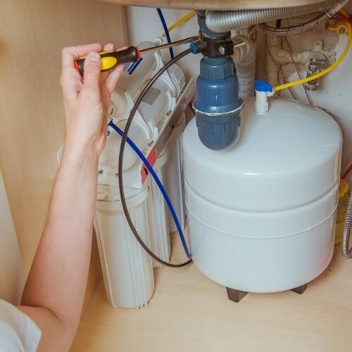 tightening an under sink water filter